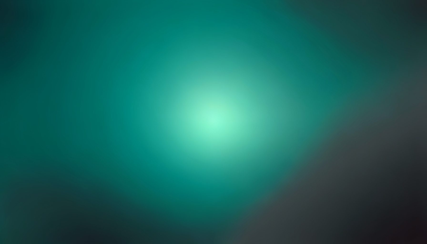 A warm abstract gradient of deep teal fading into soft charcoal, with a gentle luminous glow near the center suggesting hope and contemplation.